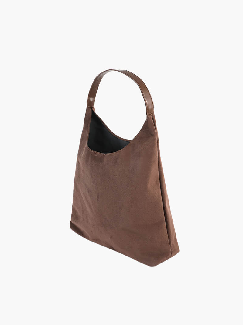 Handtasche in Wildlederoptik – Bild 10