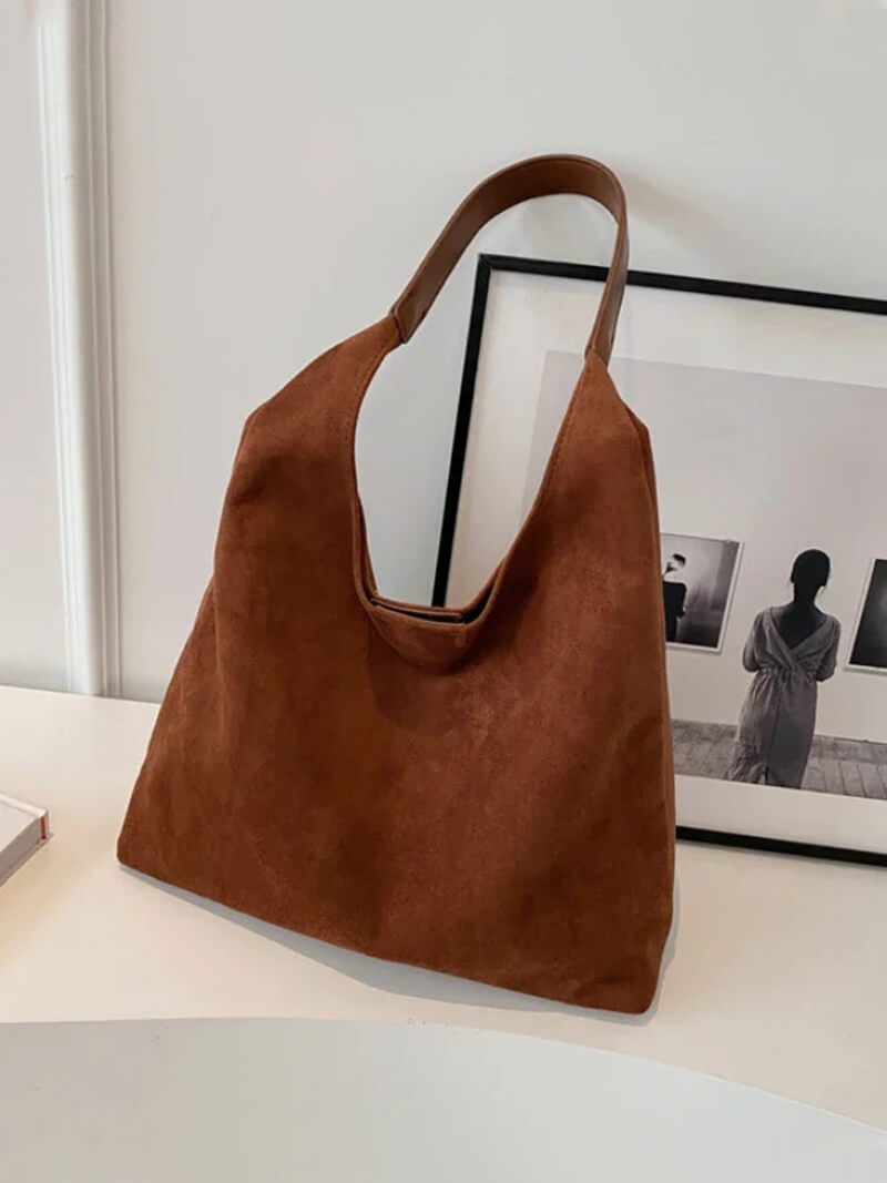 Handtasche in Wildlederoptik – Bild 3